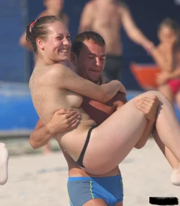 A bunch of sexy beach voyeur babes in bikinis, thongs and topless
