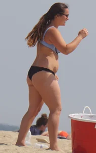 Thick girl on the beach in a bikini