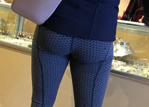 Brunette jewelry shopping in leggings with a nice ass