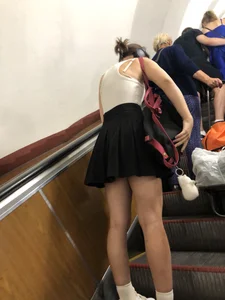 Candid girl in a skirt, low angle creepshots in a subway