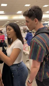 Pretty babe in tight jeans showing nipples in book store w bf (Not OC)(Face shot)