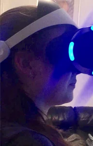 Candid Teen in White Socks And Yoga Pants Sitting With a VR Headset On
