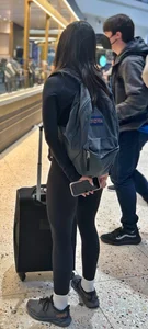 Cute girl with glasses in leggings
