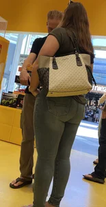 Thick brunette filling out jeans at Lego Store