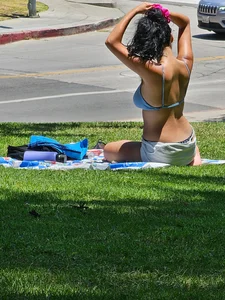 Suntanning Season is back! Black Thong Girl Tanning!