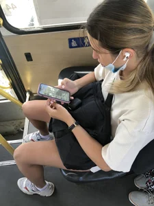 Hot Candid Girl Wearing a Face Mask in Mini Shorts With Great Legs Sitting in a Public Bus Creepshots
