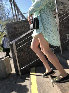 Girl in a Dress With Sexy Legs in Subway and on a Street
