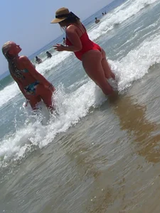 Thick big booty girl in a swimsuit with blonde friend in a bikini