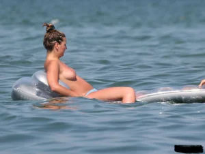 A bunch of sexy beach voyeur babes in bikinis, thongs and topless