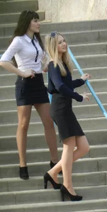 Group of Hot Girls in Blouses, Skirts and High-Heeled Shoes Photographing Each Other In a Park Creepshots