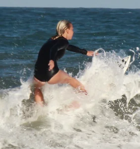 Hot surfer chicks out in the water
