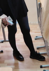 Slim Legs of a Candid College Girl in a Skirt, Creepshot in the Classroom