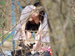 Two gorgeous candid girls secretly changing clothes in a park by a lake, some tits flashing going on, voyeur creepshots