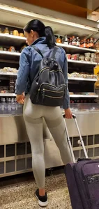 Beautiful brunette shopping in tight grey spandex with a great ass