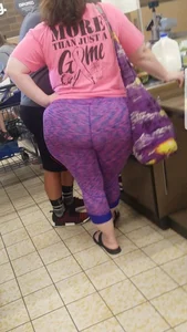 Fat booty milf in purple leggings at the grocery store
