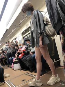 Cute Girl in Shorts and Sneakers With Hot Legs in Subway Train Creepshots Gallery