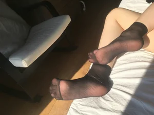 Teen Girl’s Feet in Black Transparent Socks Home Photo