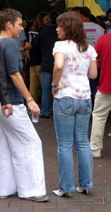 Milf wearing tight blue jeans with a nice ass at the street market creepshot