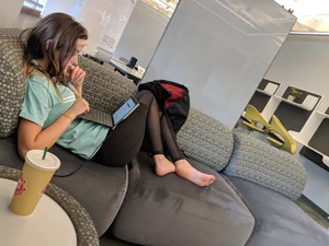 Adorable Skinny Candid Teen in Tights Lying With Her Laptop on the Couch - Her Feet Closeup