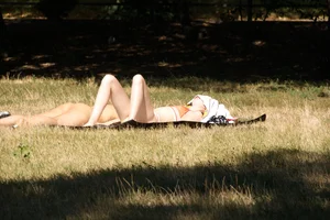 Creepshots of some girls in the park getting some sun in bikinis