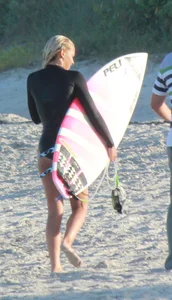 Hot surfer chicks out in the water