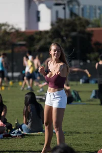 Girl in Shorts and Top in the Park Creepshot