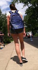 Hot college girl in little jean shorts showing some cheeks and legs
