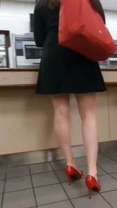 Black skirt, red shoes in the caf