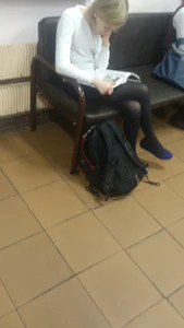Skinny College Teen Blonde in Black Pantyhose Reading With Crossed Legs Crepshot