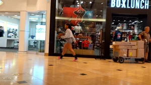 Candid ebony babe with an amazing ass and vpl in grey Nike spandex shorts