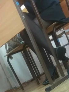 Girl in a Dress and Black Pantyhose Sitting with Legs Crossed - Classroom Candid