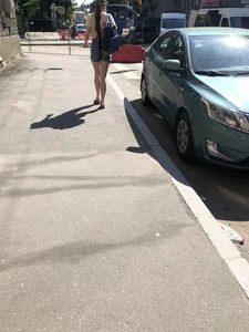 Girl with awesome pale legs in shorts wearing a backpack street creepshots
