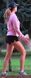 Beautiful skinny girl out for a walk in little shorts