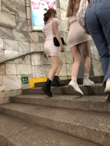 Group of Teens in Short Dresses in a Subway Train and on an Escalator Gallery