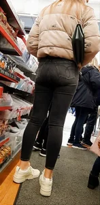 Teen in tight jeans shopping