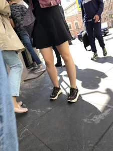 Very nice legs of a candid girl wearing a skirt