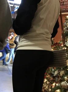 Christmas store girl with a nice booty in leggings with vpl