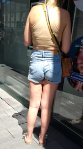 Street Candid Girl in a Top And Denim Shorts, Nice Butt And Legs