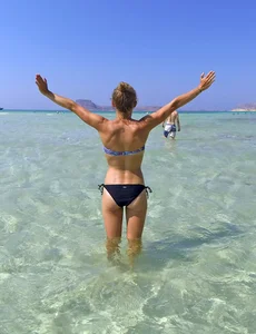 Petite sporty blonde in Greece