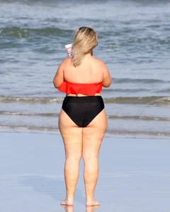 Thick BBW blonde lady in a bikini at the beach
