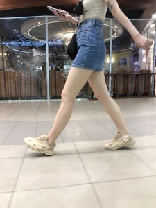 Sexy Candid Girl in a Denim Skirt And Sneakers With Hot Pale Legs Mall Creepshots Gallery