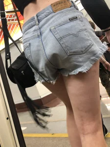 Tall Candid Teen Girl in Denim Shorts and a Top With an Injured Knee Subway and Street Creepshots - Hot and Muscular Long Legs