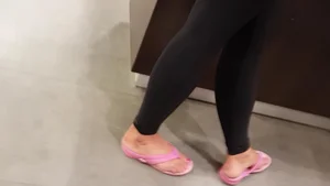 Nice ass in leggings standing in line shopping