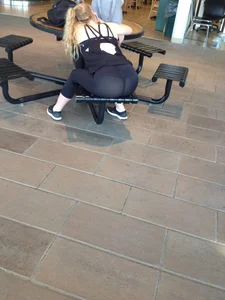 Girl Sitting on Bench in Seethrough Tights