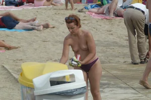 Topless girls on a beach in Barcelona