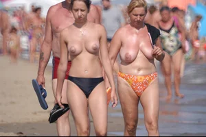 Girls on a nude beach in Bibione, Italy