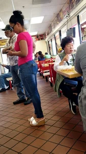 Latin milf in tight jeans showing hot ass