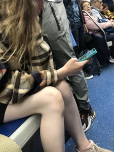 Very cute candid girl with very pale skin sitting in a subway train creepshots