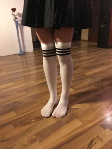 Legs in Knee Socks and Skirt