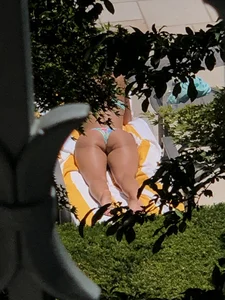 (OC) Blonde girl tanning poolside